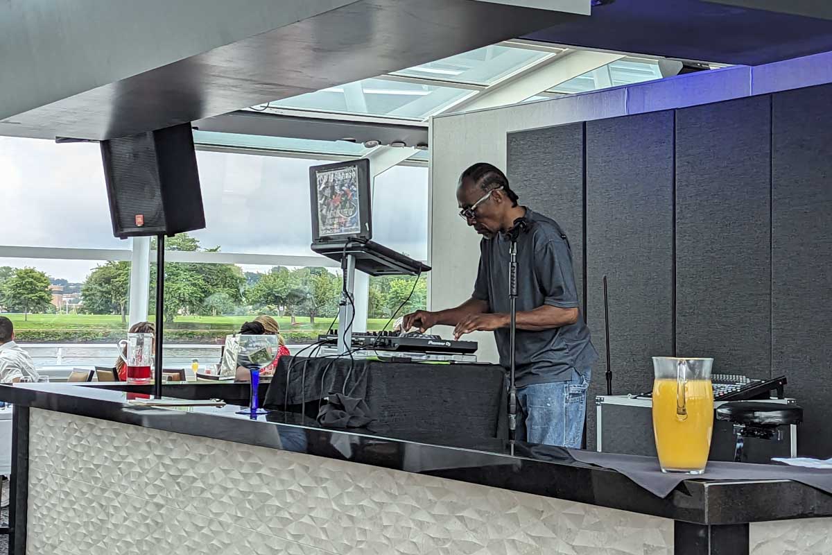 A dj plays on a river cruise in Washington DC, USA