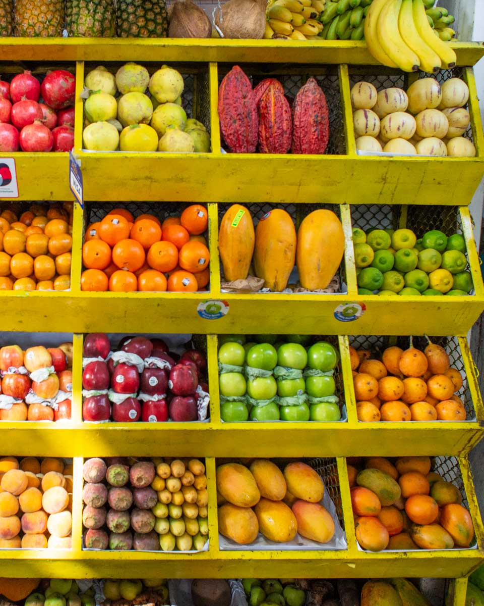 A fruit stand at a market in Lima Peru on a cooking tour