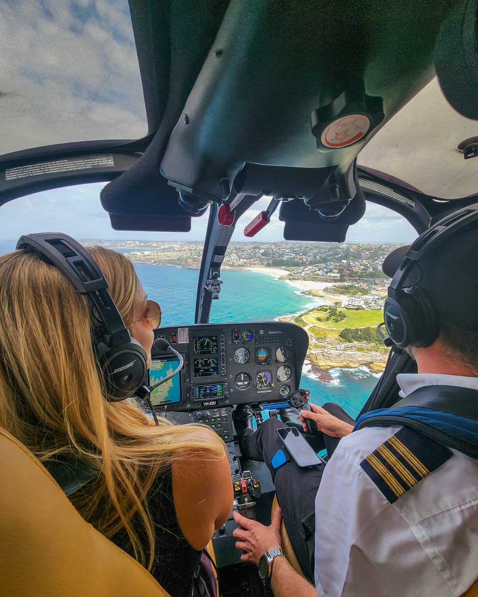 Bailey and the pilot enjoy the view on our scenic helicopter flight