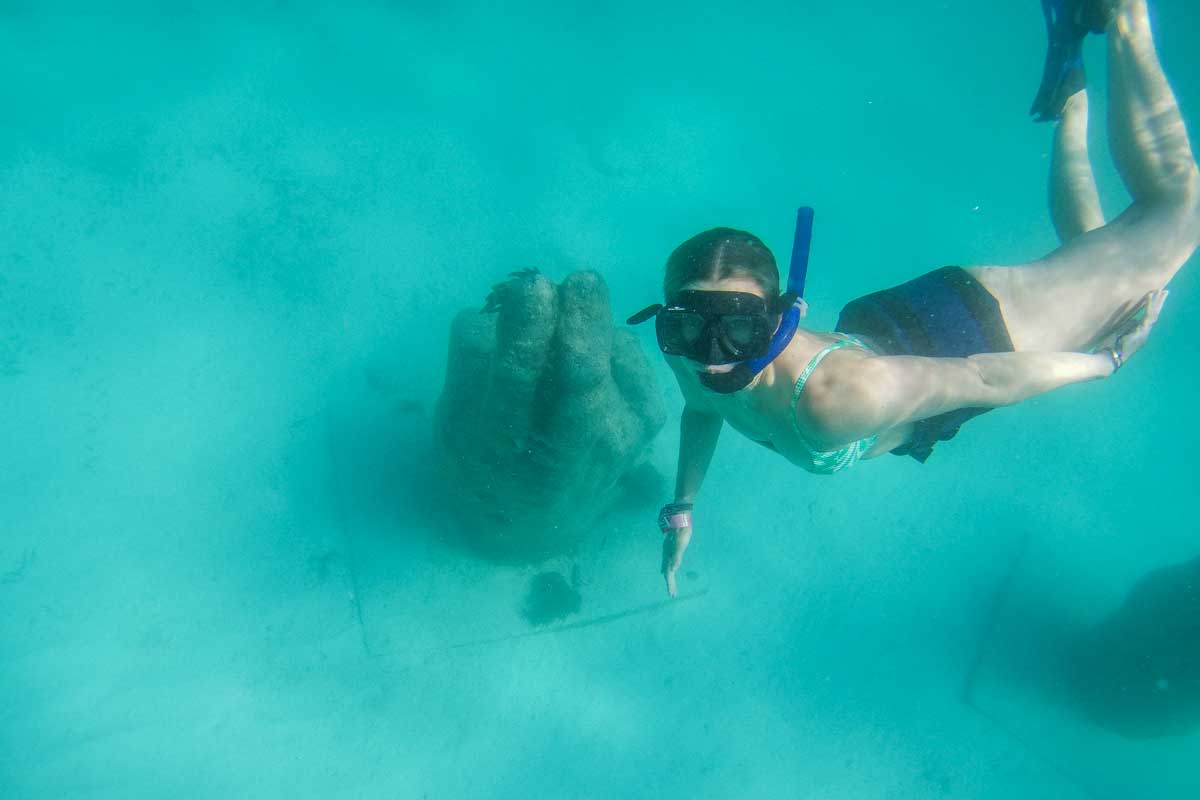 Bailey dives down around a manmade coral in Playa del Carmen, Mexico while snorkeling