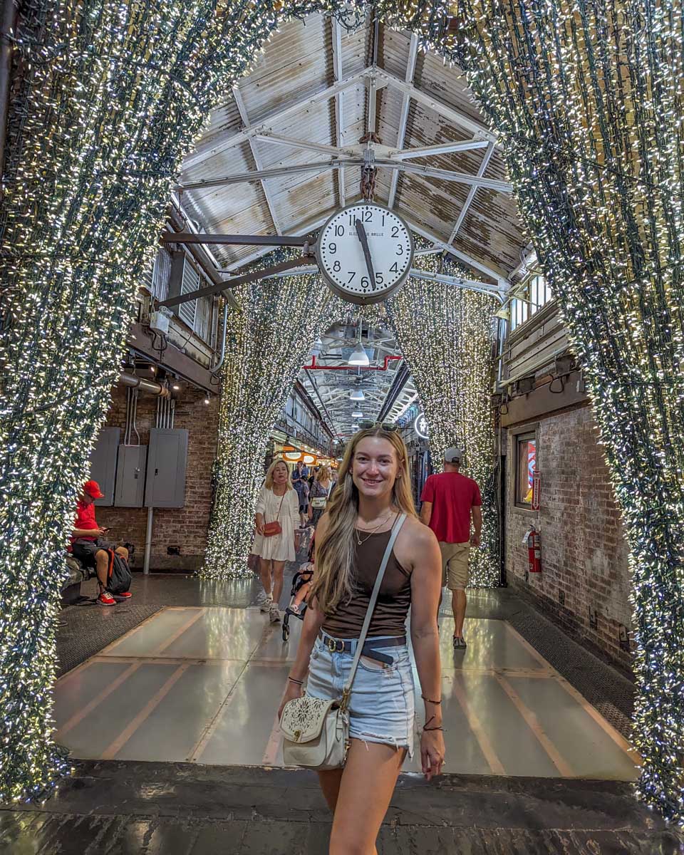 Bailey poses for a photo inside the Chelsea Market in New York City