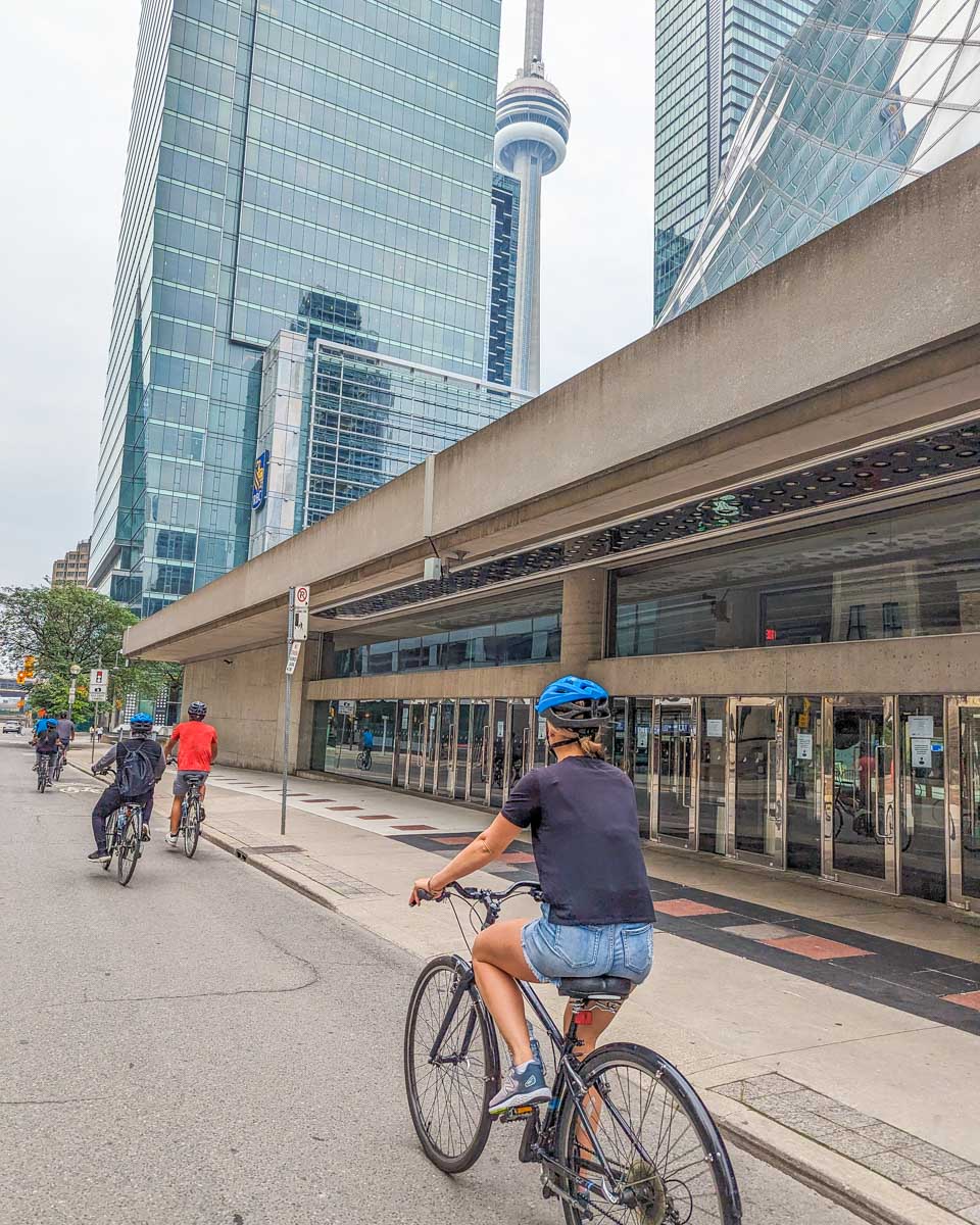 Bailey rides her bike in downtown Toronto on a bike tour