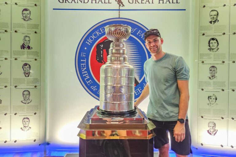 Daniel poses for a photo with the original Stanley Cup in Canada