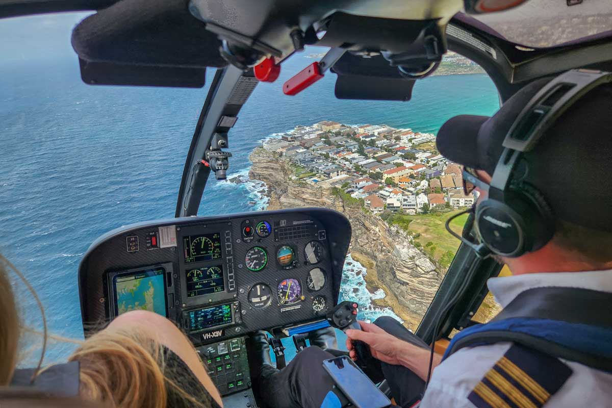 Flying over the coastline of Sydney on a scenic helicopter flight, Australia