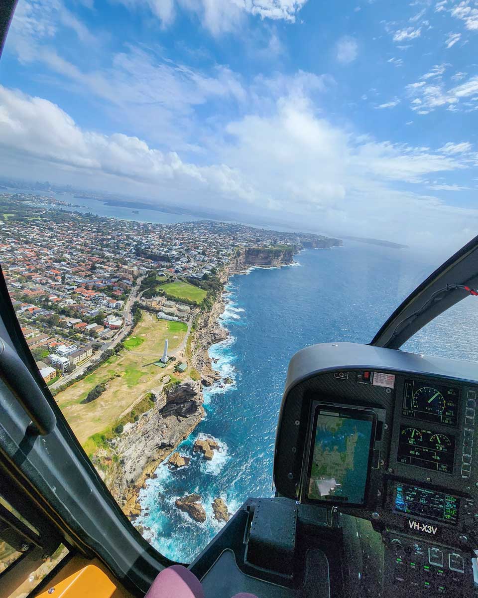 View out the front of a helicopter on scenic flight over Sydney, Australia
