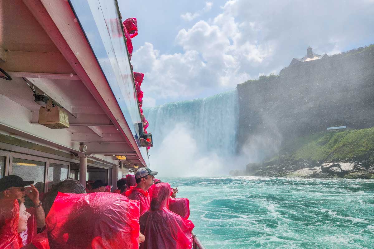 A boat approaches Niagara Falls on a tour from New York City