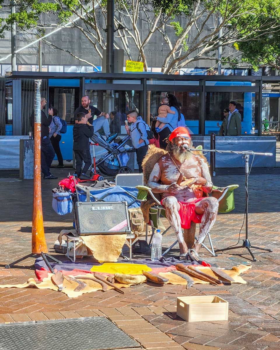 An aboriginal plays traditional music in Sydney, Australia