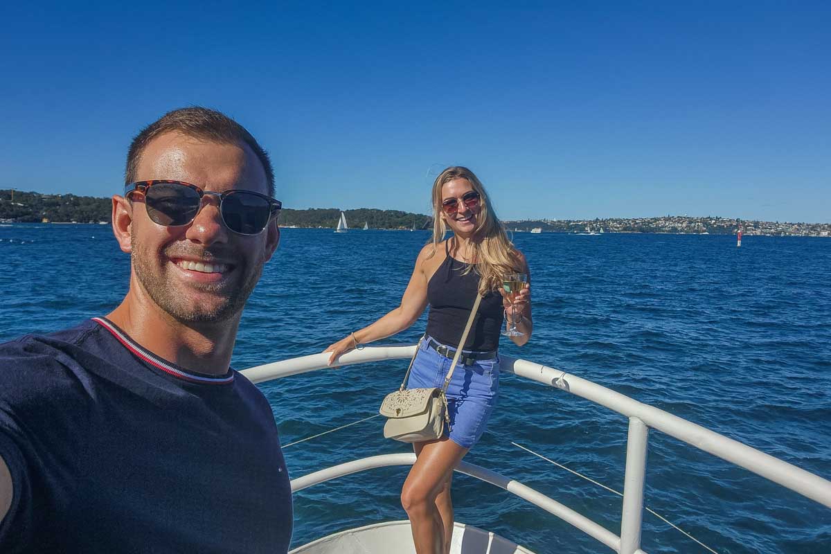 Bailey and Daniel take a selfie on a cruise in Sydney, Australia