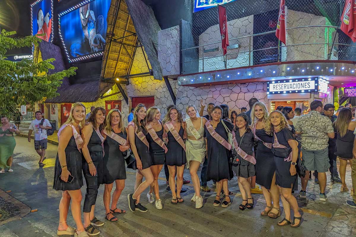 Bailey and her friends stand outside Coco Bongo in Mexico