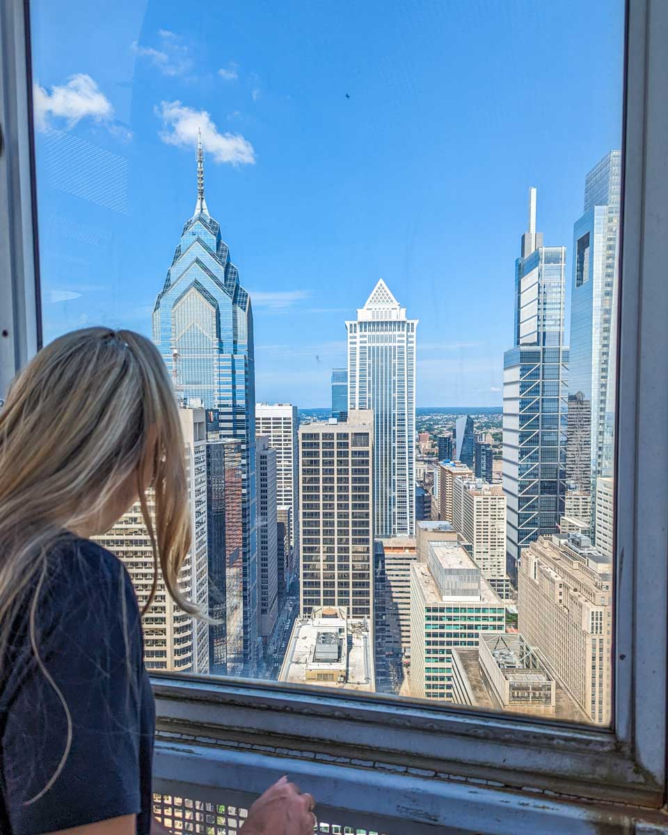 Bailey looks out the window of City Hall Tower in Philadelphia