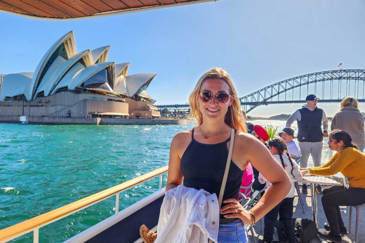 Bailey poses for a photo on the deck of a Sydney Harbour Cruise