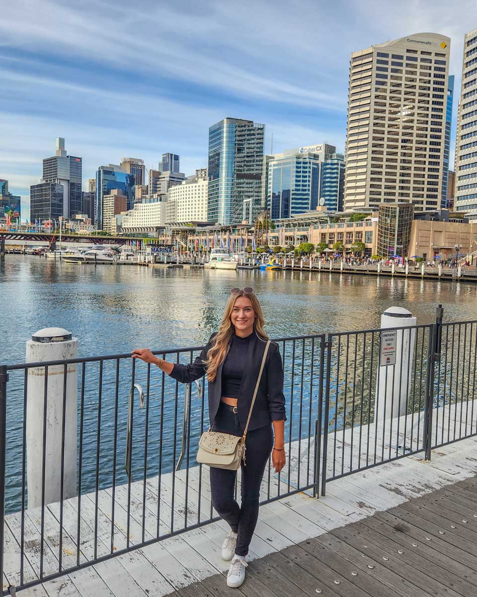 Bailey poses for a photo while on a walking tour through Darling Harbour, Sydney