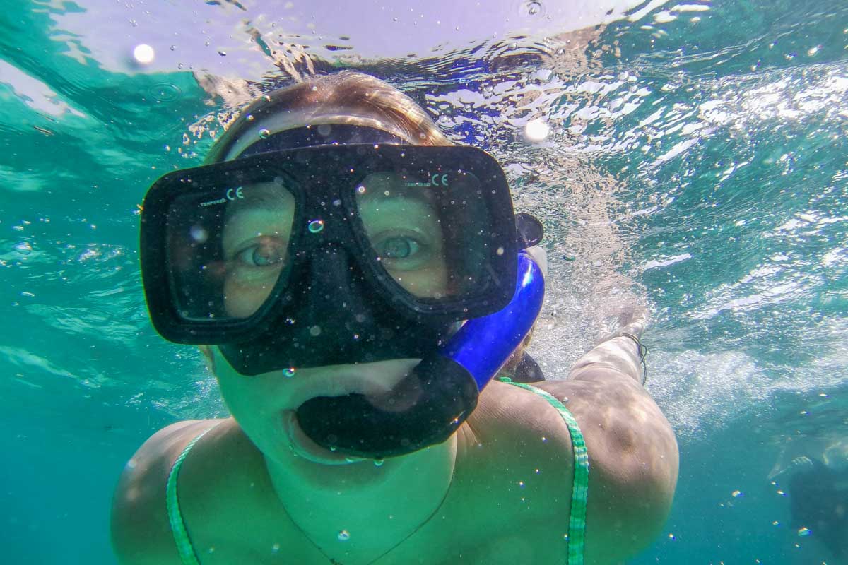 Bailey under the water while snorkeling in Isla Mujeres, Mexico