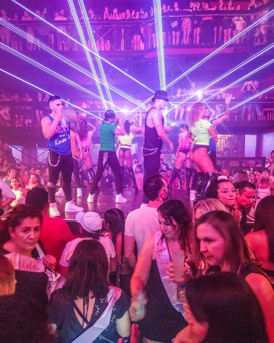 Crowds of people suround a stage at Coco Bongo in Mexico during a performance