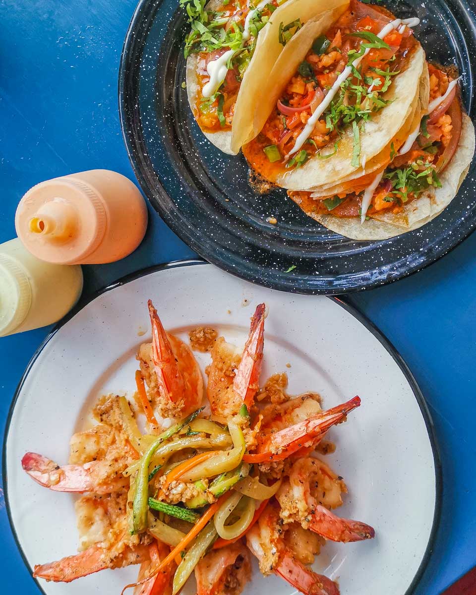 Food on plates that we tried on a food tour in Puerto Vallarta, mexico