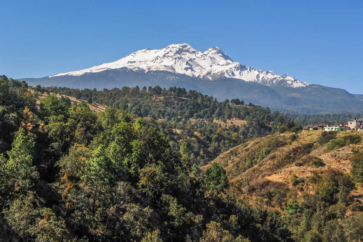 Iztaccihuatl Volcano in the distance
