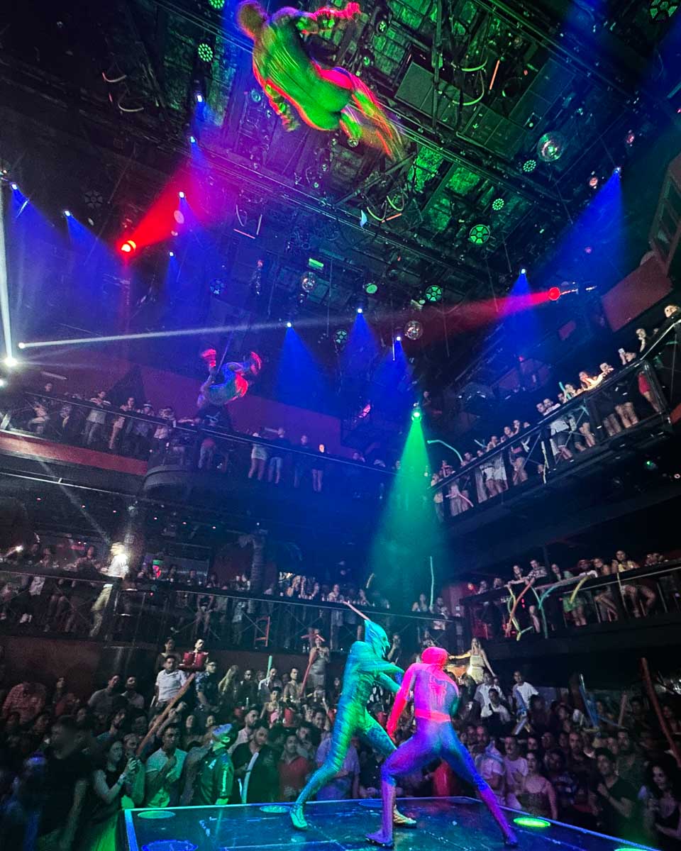 Spiderman at the Green goblin fight on stage at Coco Bongo, Mexico