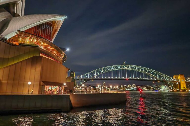 The Sydney Harbour Bridge and Sydney Opera House in Sydney as seen from the Journey Beyond the Cruise Sydney dinner cruise