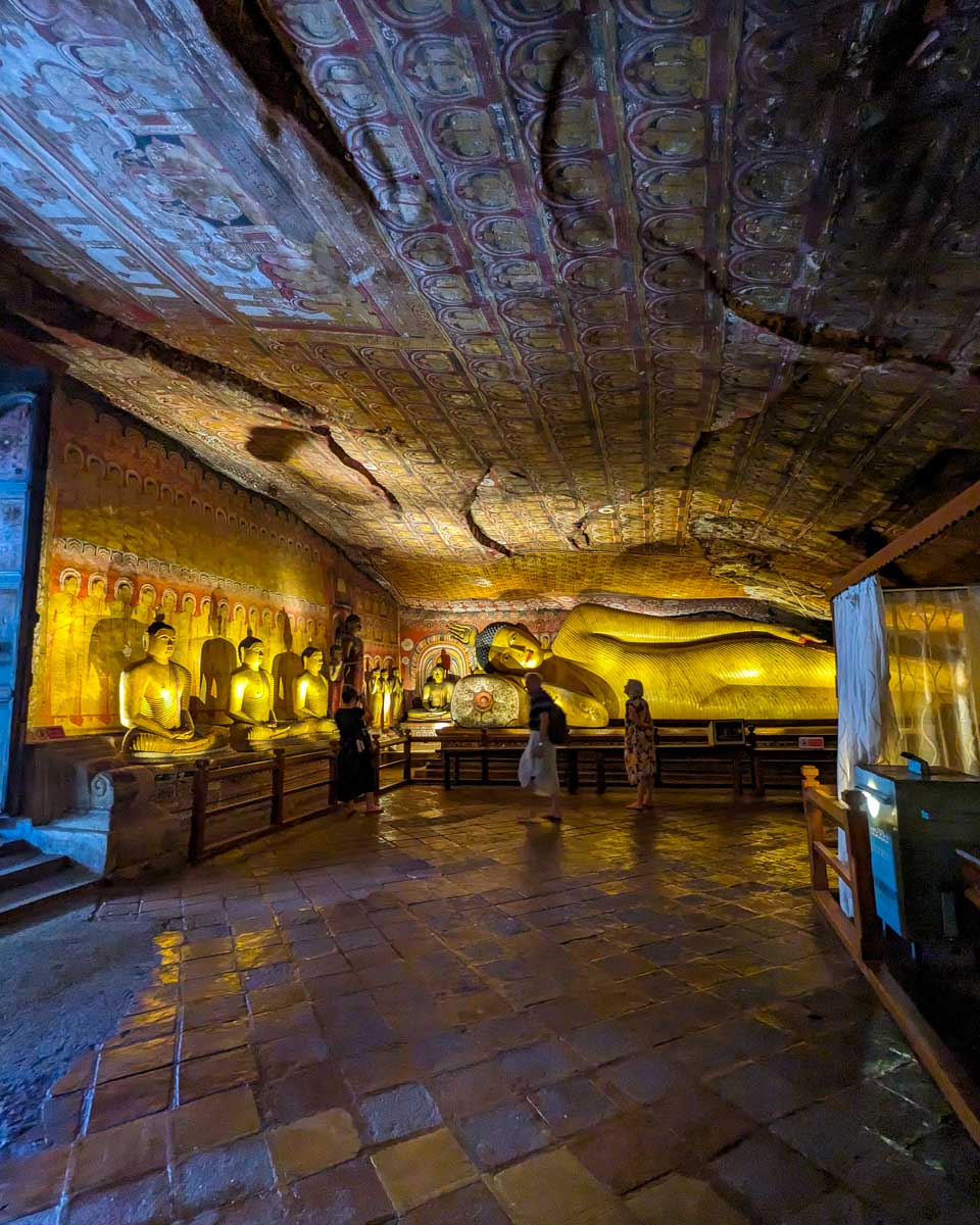 A large sleeping golden Buddah in the Dambulla Caves Sri Lanka