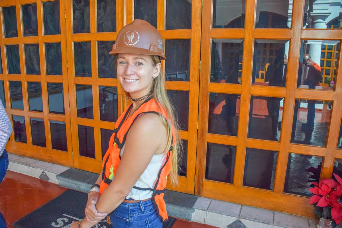 Bailey wears safety gear during a distillery tours in Mexico