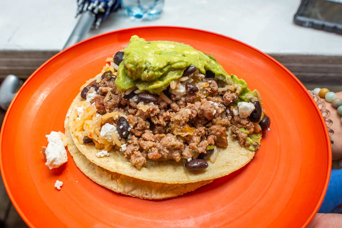 Beef taco with beans on a taco tour of Playa del Carmen, Mexico