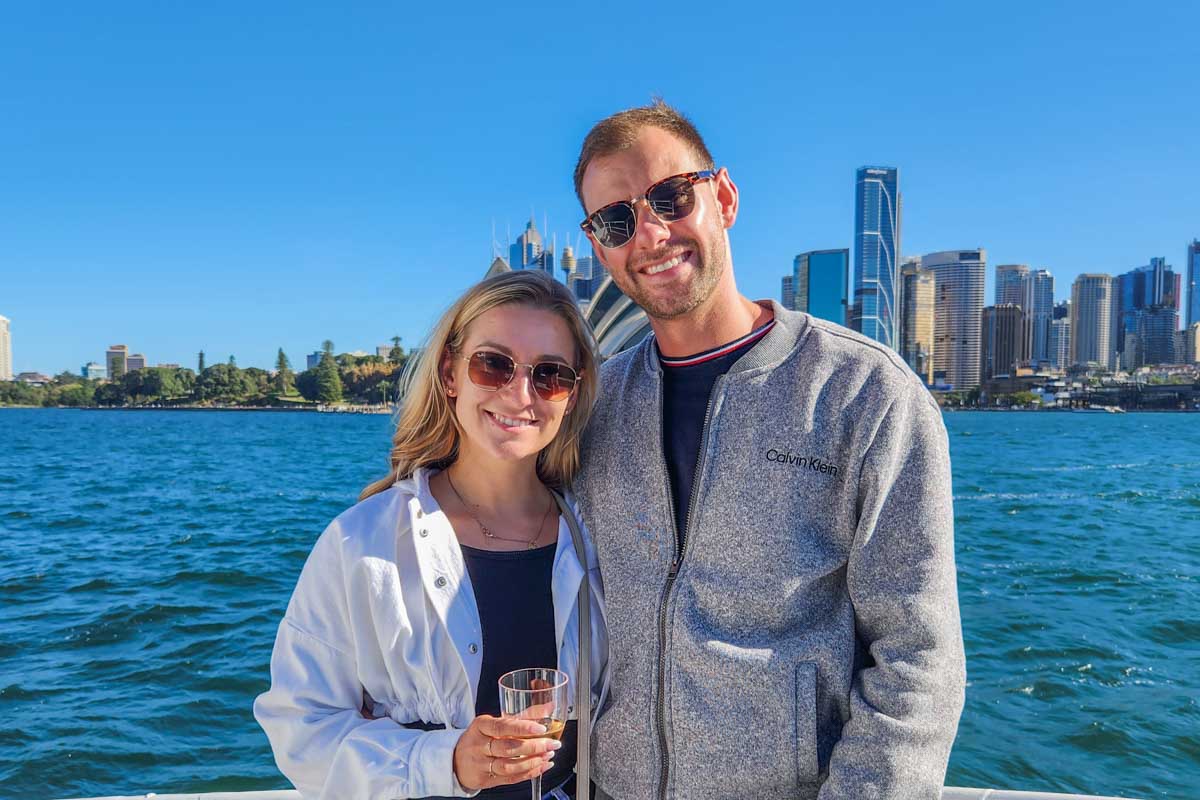 Daniel and Bailey pose for a photo on a cruise in Sydney