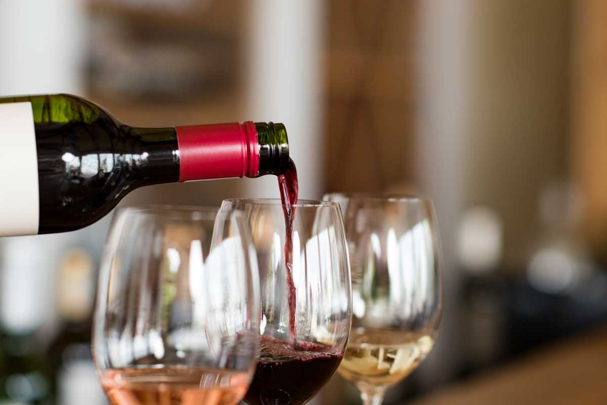 A glass of wine is poured for a tasting in the Hunter Valley near Sydney