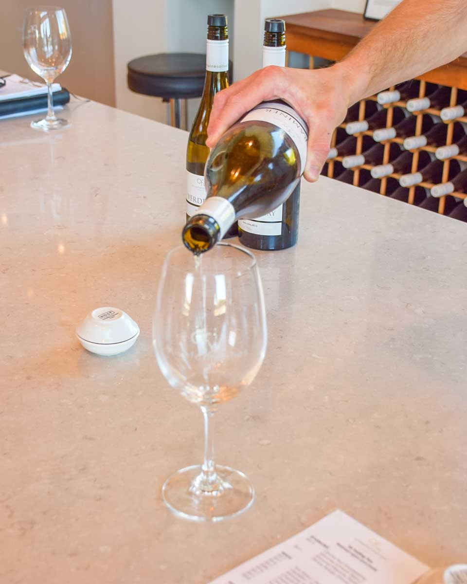 A tasting glass of wine is poured at a winery in the Hunter Valley near Sydney, Australia