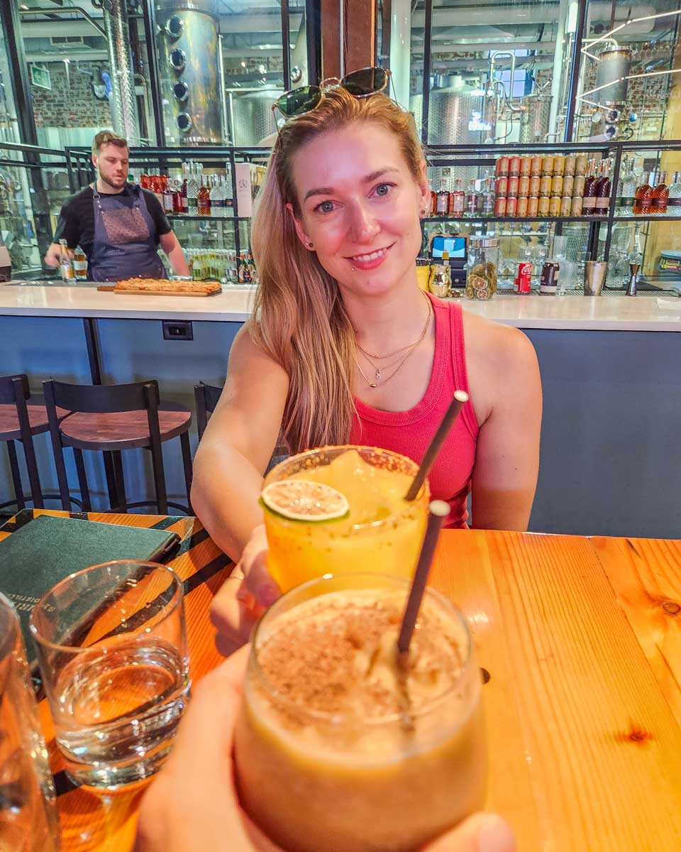 Bailey enjoys a cocktail at Spirit of York Distillery in Toronto