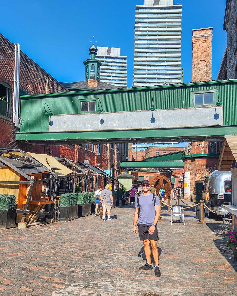 Daniel poses for a photo in the Toronto Distillery District, Canada