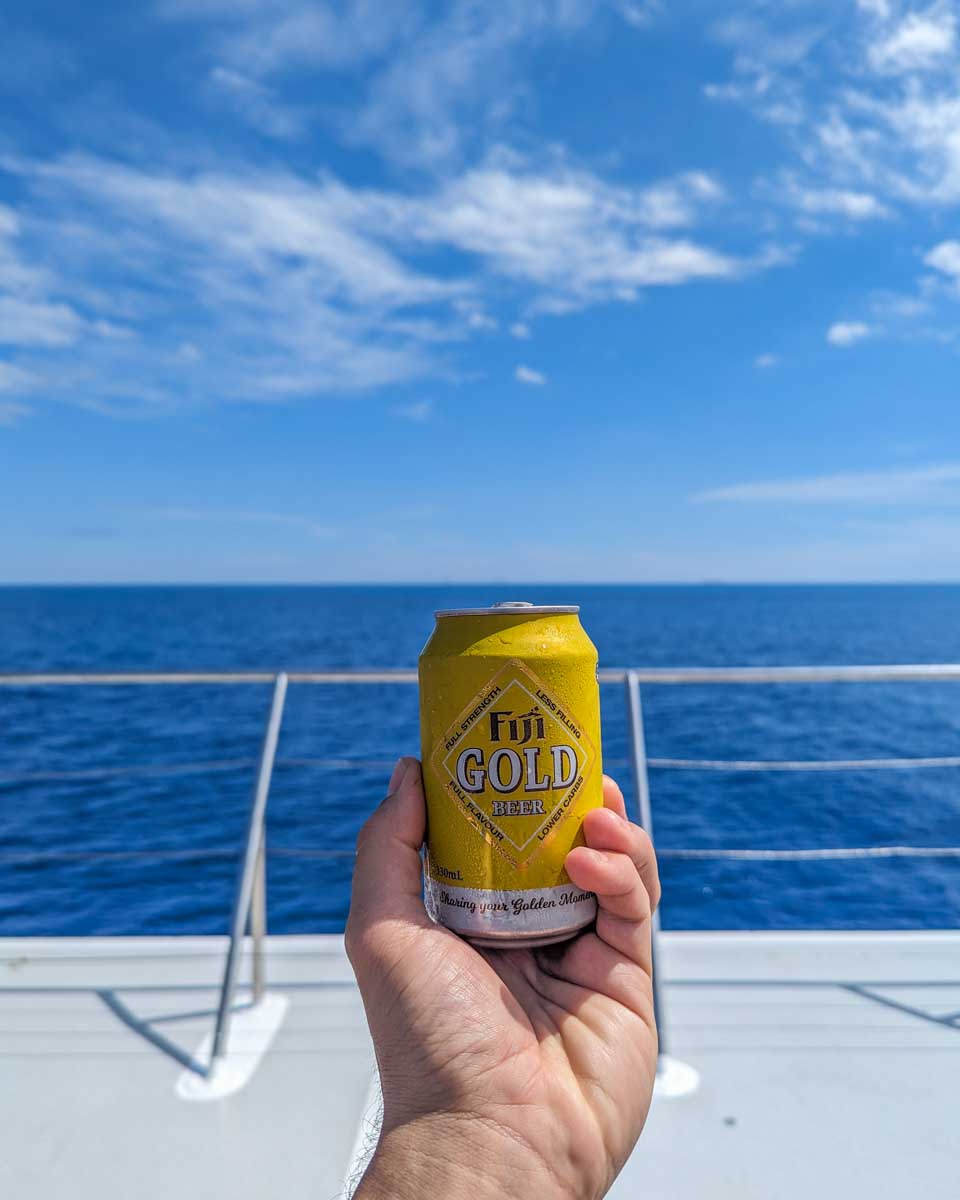 A Fiji Gold beer on the boat to Tivua Island in Fiji
