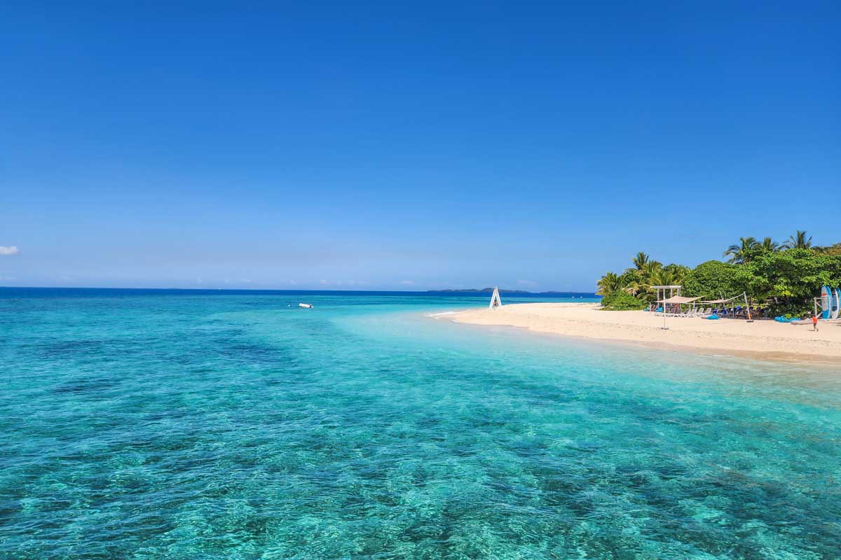 A beautiful beach and water as we arrive at South Sea Island, Fiji