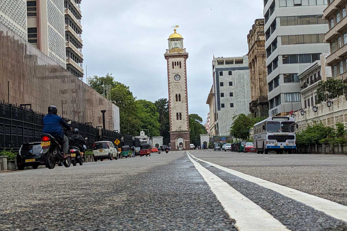 A clocktower and lighthouse building in downtown Colombo Sri Lanka