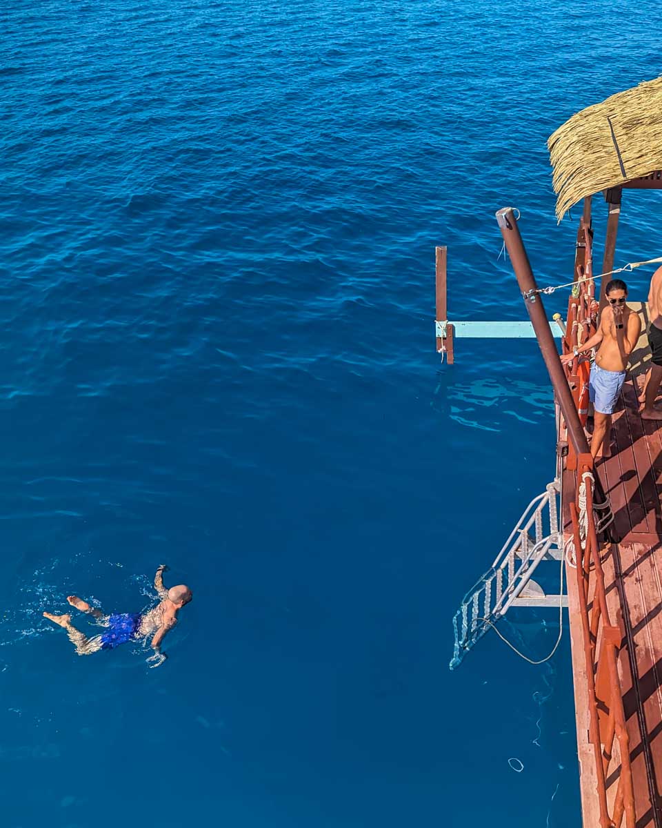 A man swims at Cloud9 Floating platform in Fiji