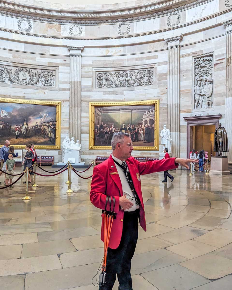 A tour guide inside the United States Capitol talks to our group in Washington DC