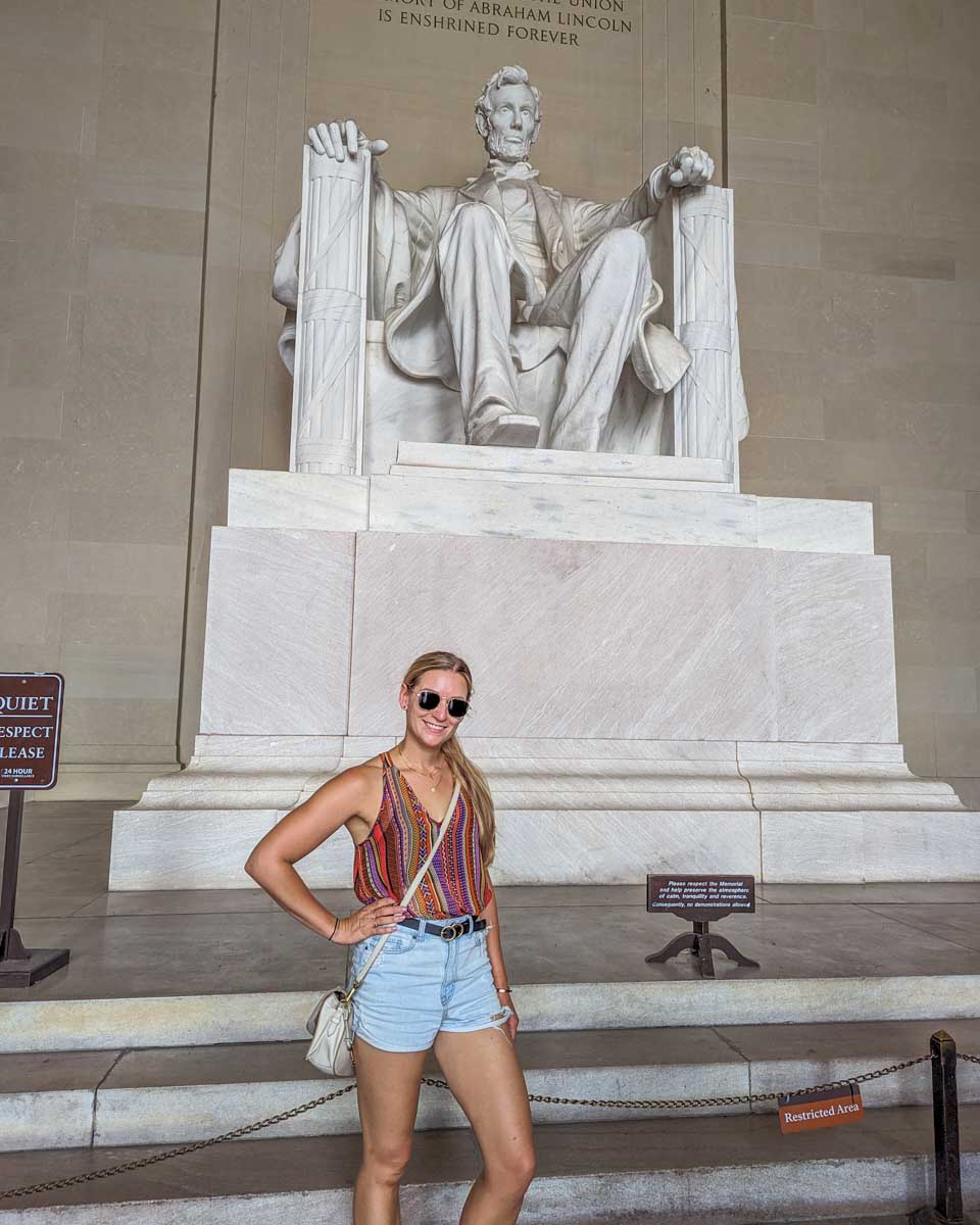 Bailey poses for a photo at the Statue of Abraham Lincoln at the Lincoln Memorial in Washington DC