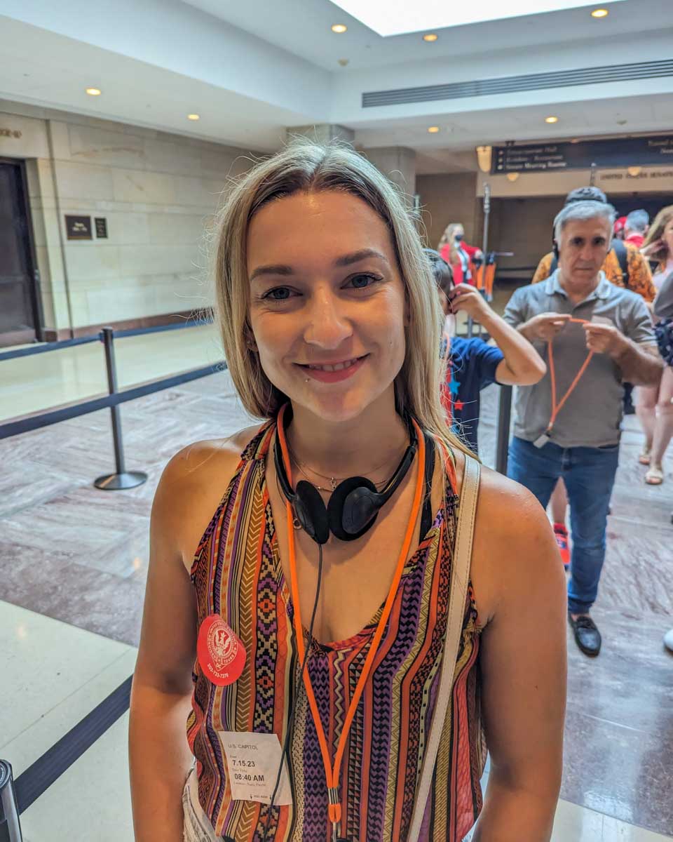 Bailey poses for a photo with her headset during a tour of the United States Capitol in Washington DC