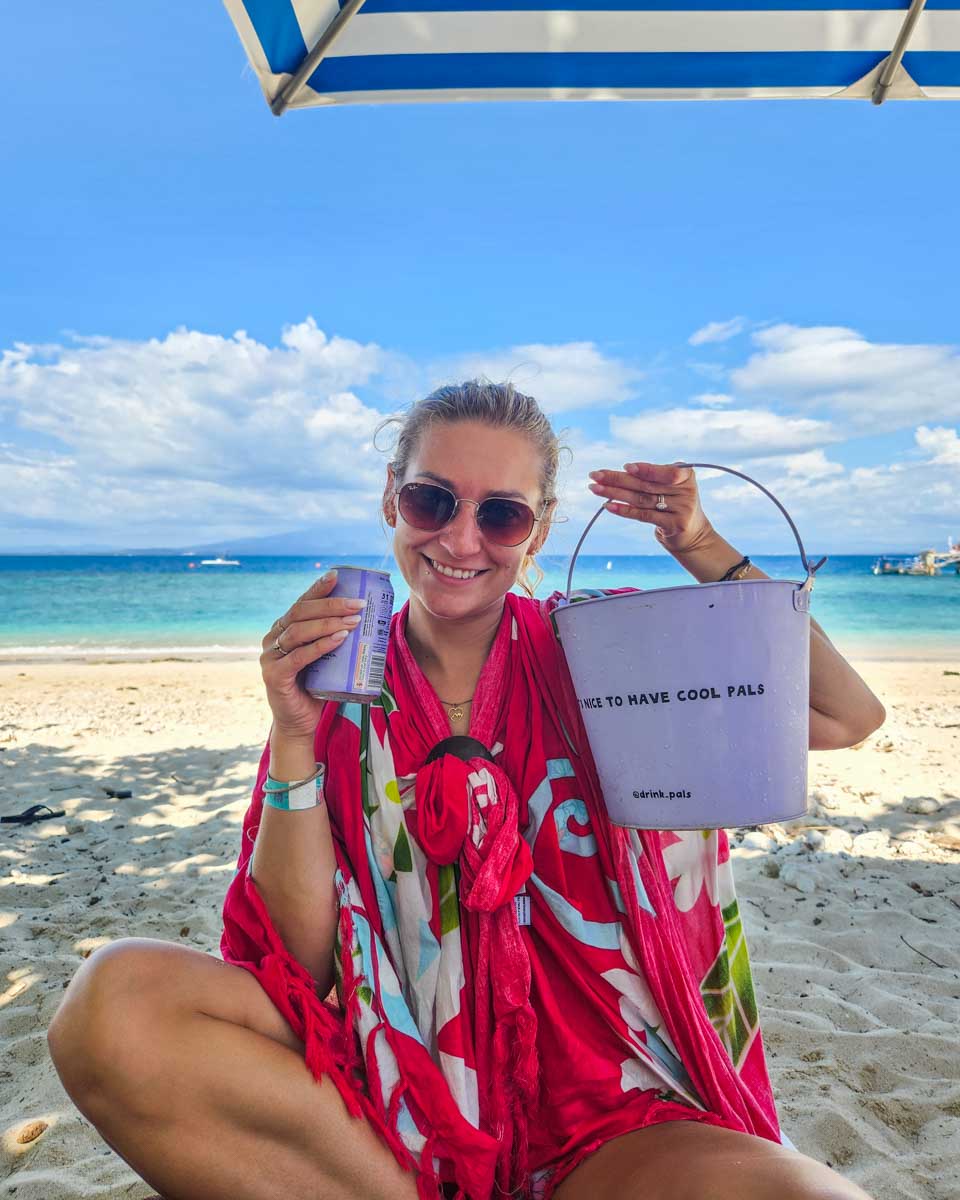 Bailey with a bucket of beer at Malamala Beach Club