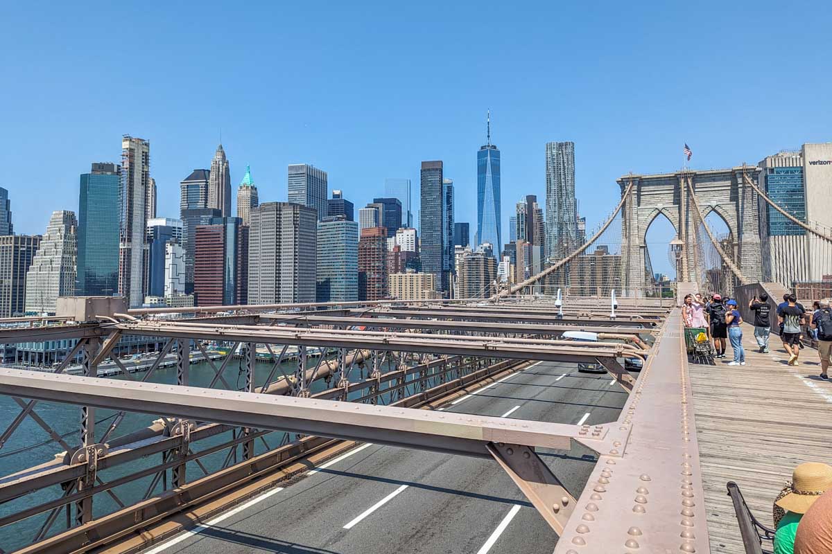 Brooklyn Bridge pathway with Manhattan in the background in NYC