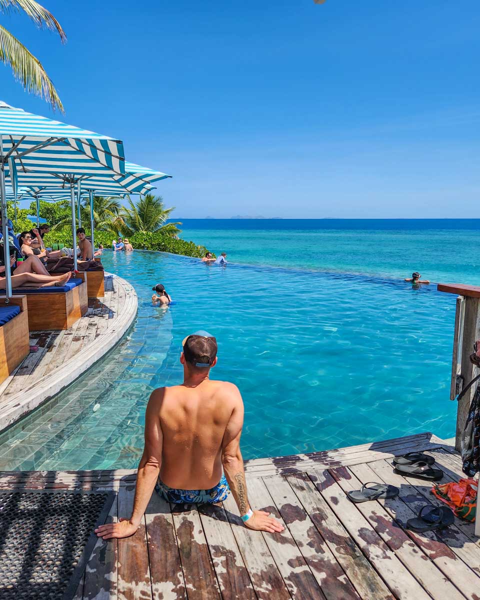 Daniel relaxes poolside at Malamala Beach Club in Fiji
