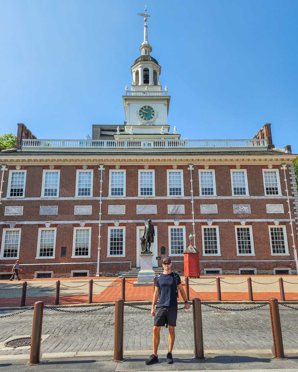 Daniel stands out the front of Independence Hall on a history tour in Philadelphia, USA