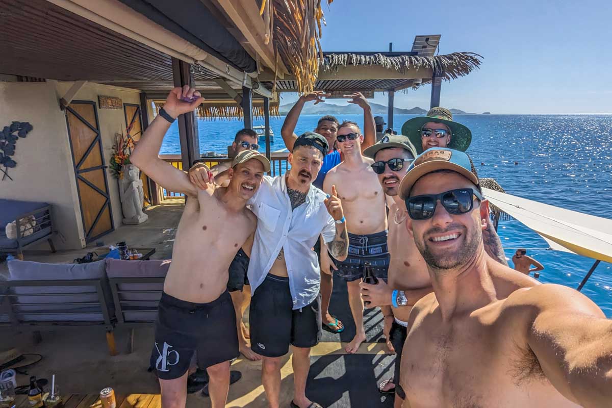 Daniel takes a selfie with his friends at Seventh Heaven Fiji Floating Platform