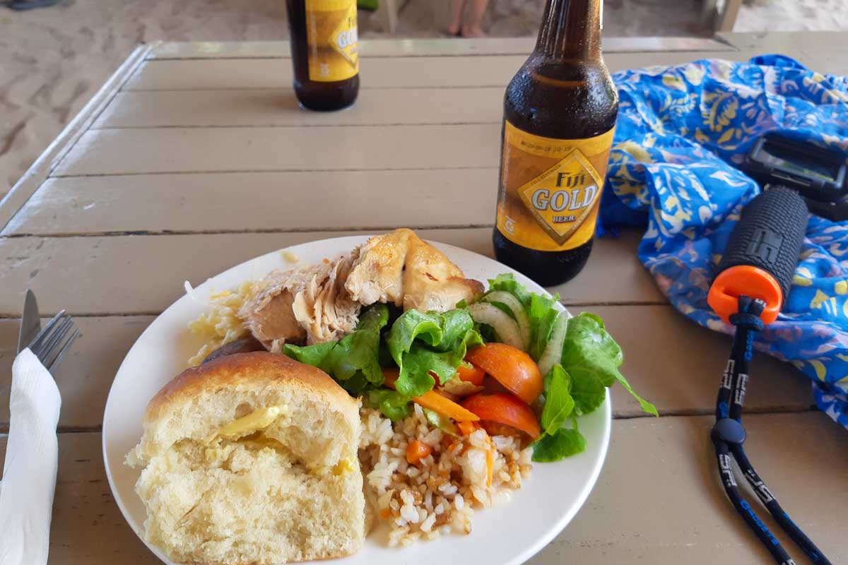 Lunch on robinson crusoe island fiji is chicken, salad and bread