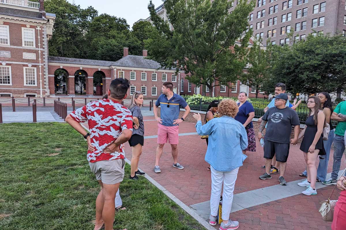 Our guide talks to us during our after dark Philly tour in Philadelphia, USA