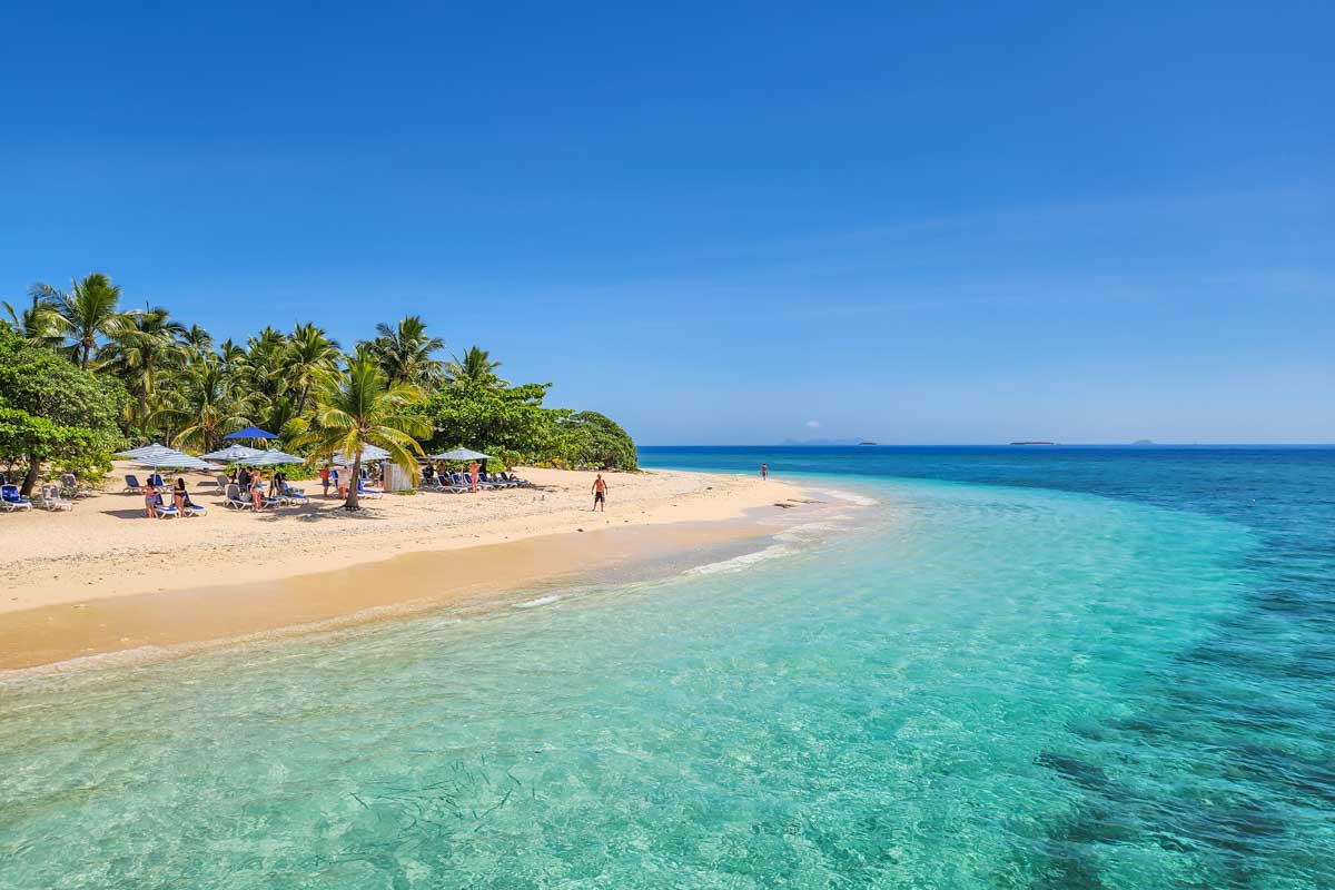 The beach and crystal clear waters of Malamala Beach Club in Fiji