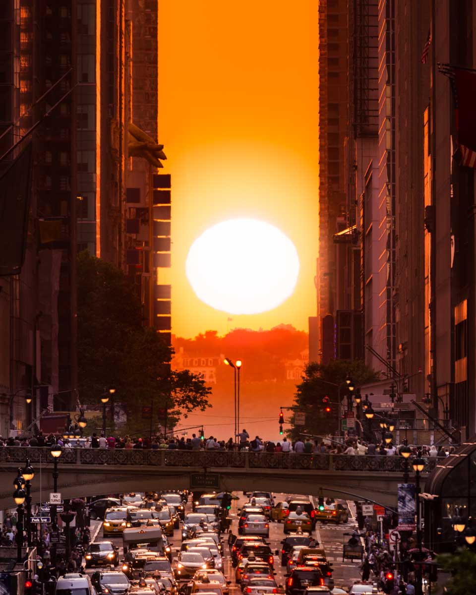 The sun sets at Manhattanhenge in NYC