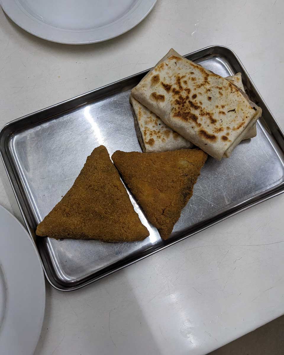 Two different kinds of samosas on a plate Kandy Sri Lanka
