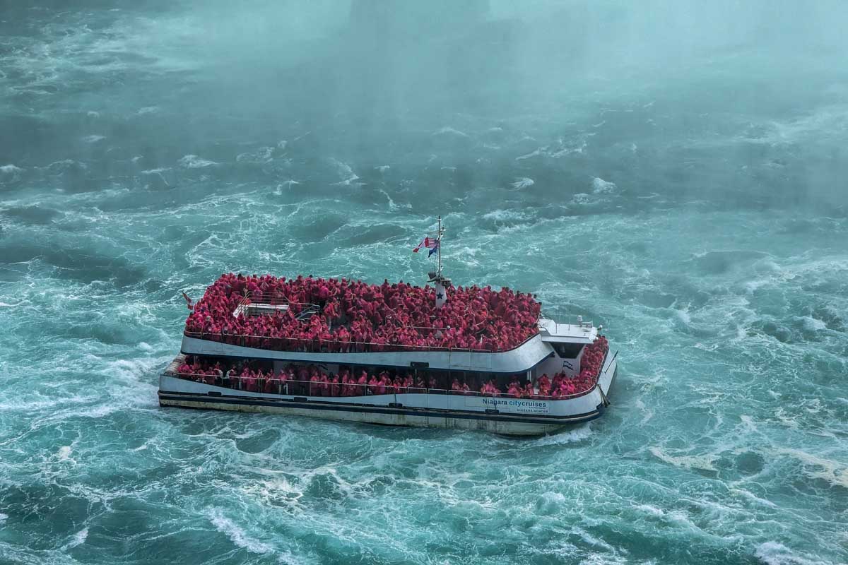 A boat heading towards Niagara falls canada