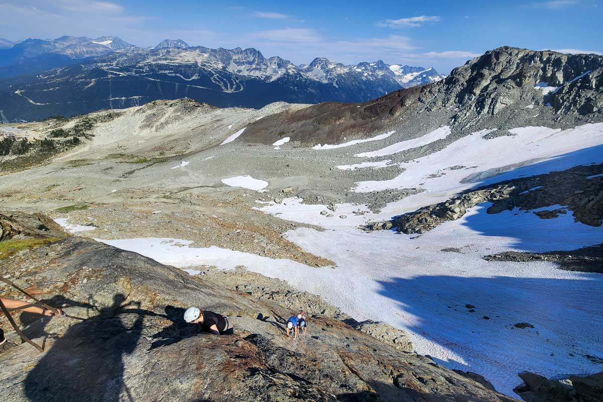 A shot of people climbing whistler during Via Ferrata, Whistler, Canada