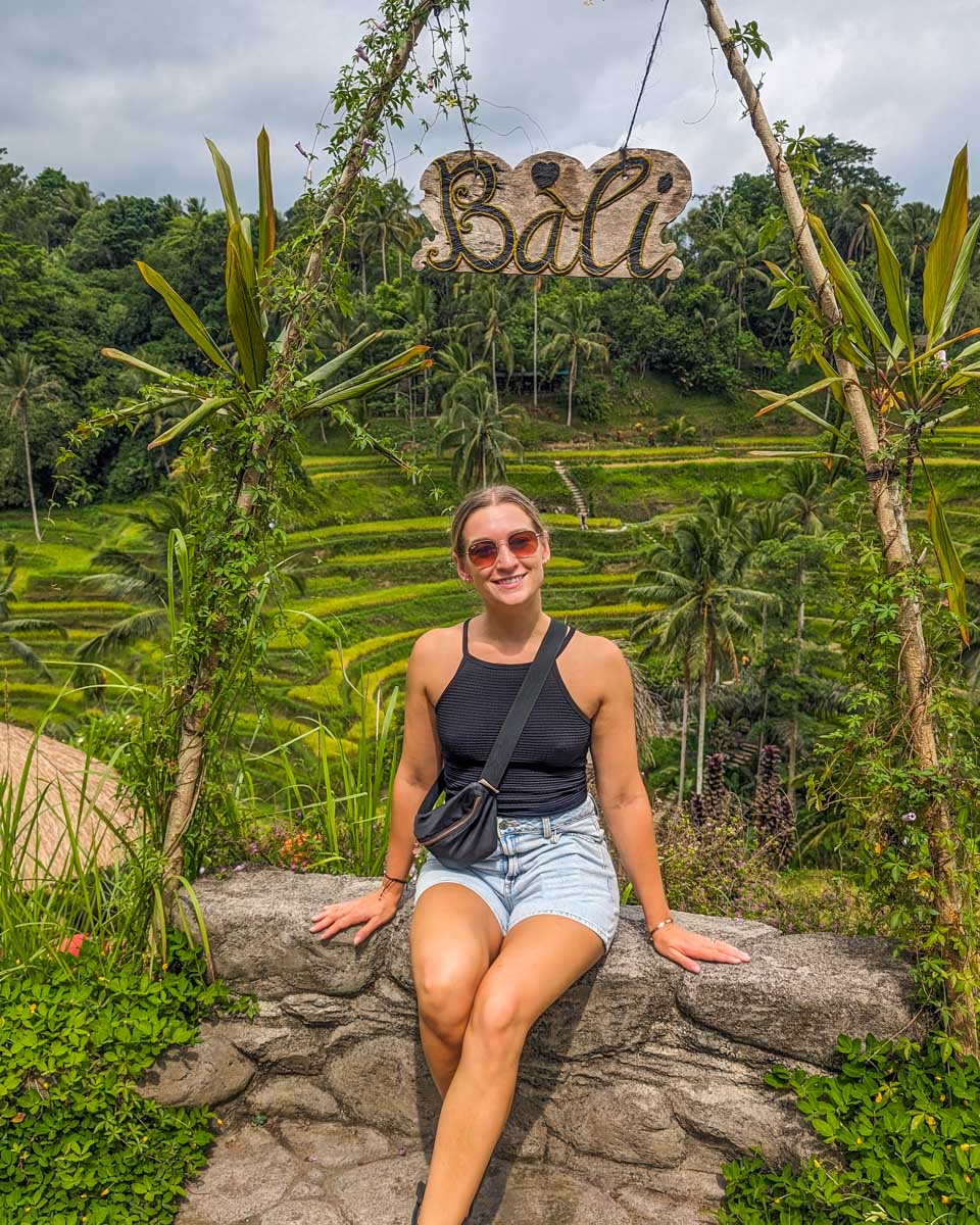Bailey poses for a photo at a viewpoint on the Ceking Rice Terrace in Bali